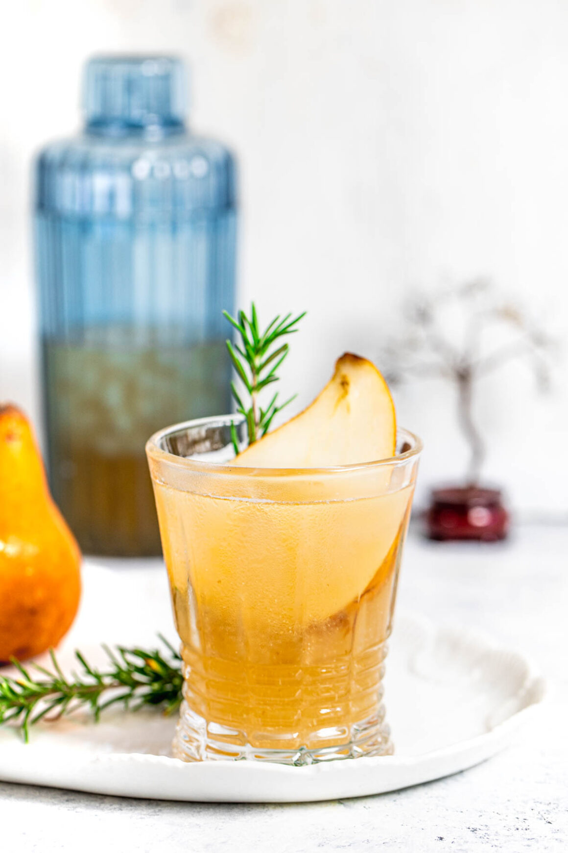 Indulge in the crisp and delicate flavors of a Pear Gin cocktail.