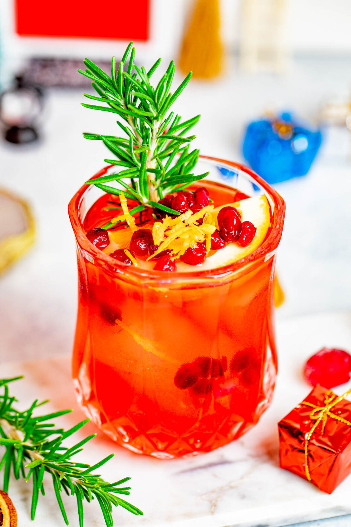 With its vibrant red hue, refreshing flavors, and symbolic pomegranate garnish, it's sure to be a hit with guests. 