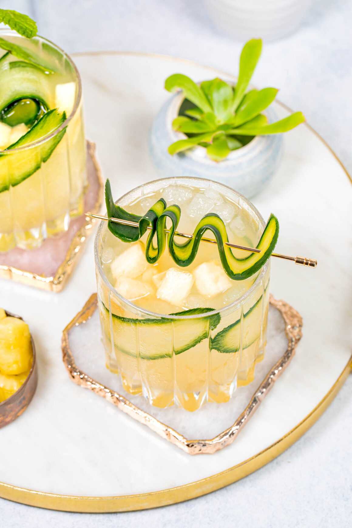 Embark on a trip to the tropics with Pineapple Cucumber Gin Refresher, a cocktail that perfectly blends the sweet and spicy notes.